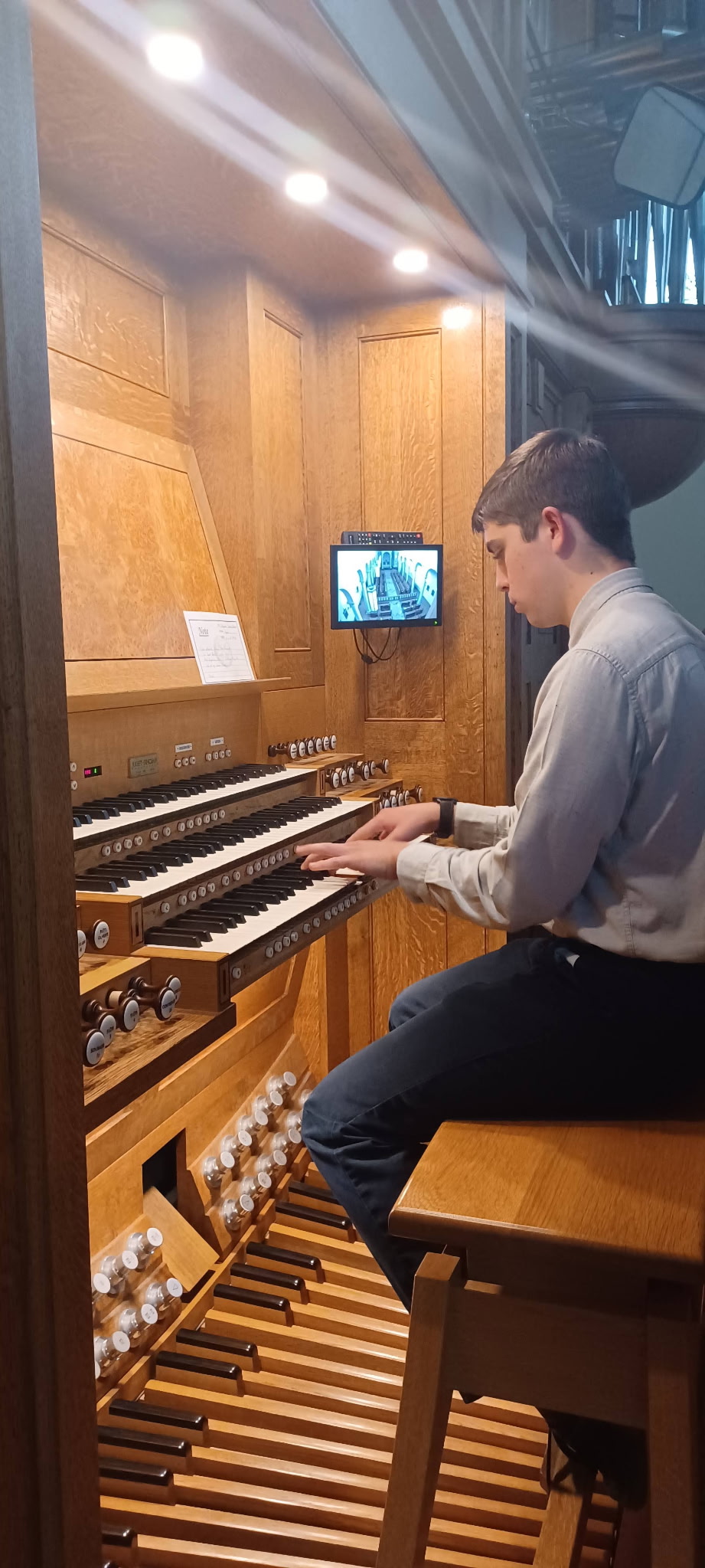 Gabriel Beggy playing a French organ at OLG Seminary